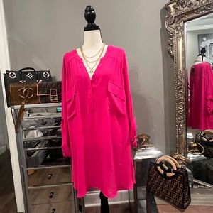 The hottest color out there. This pink blouse had pockets on the chest.